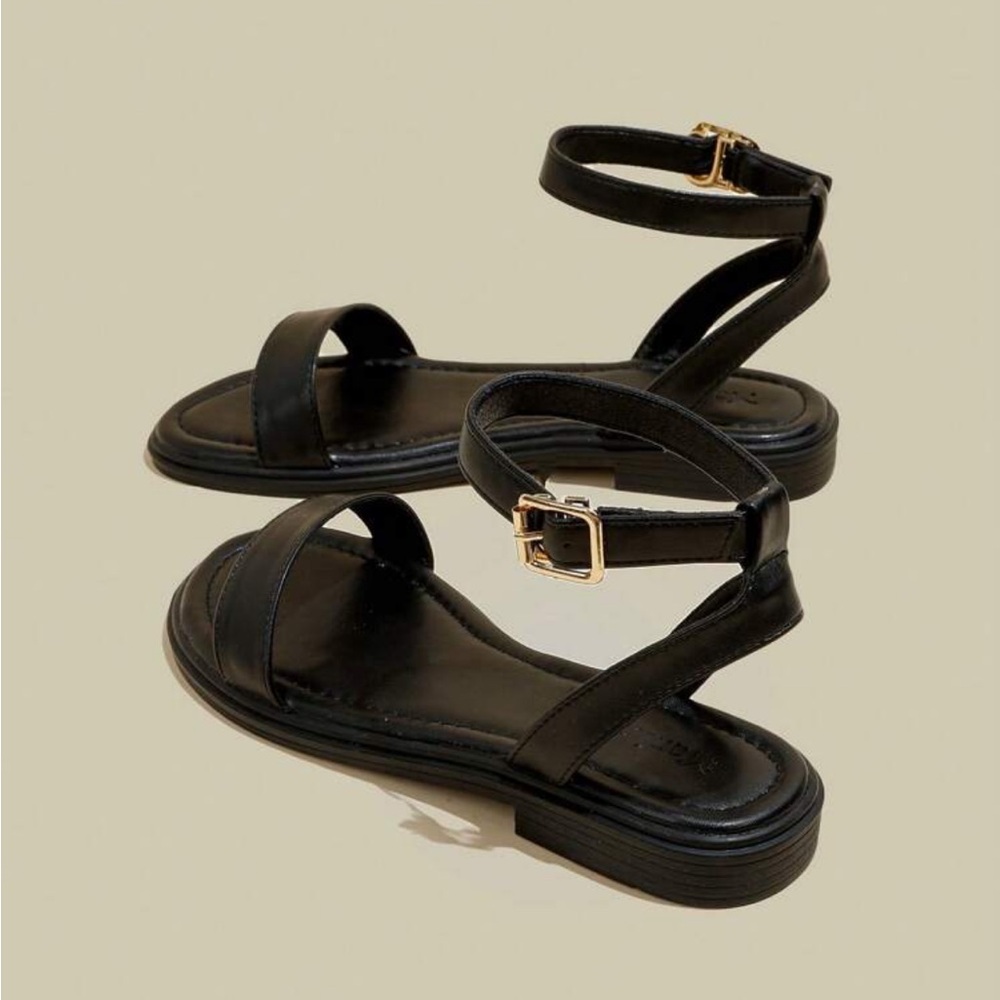 Black flat sandals